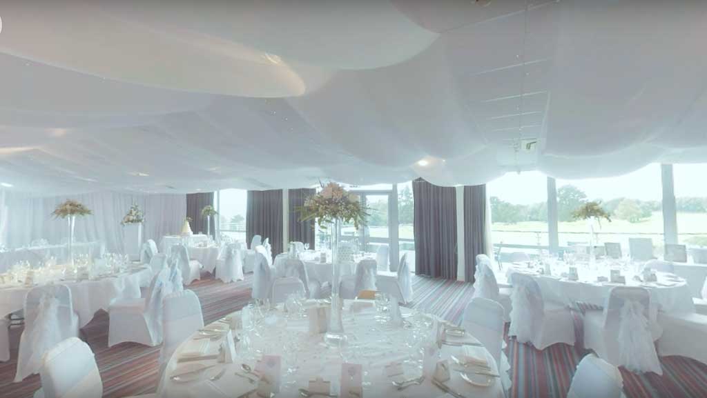 an all white formal dining room setup