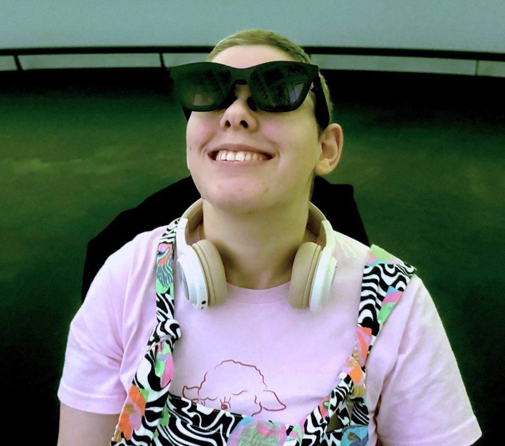 Ceri using the Includiverse glasses in the dome