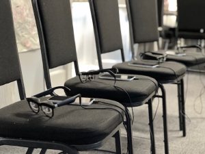 Augmented reality glasses glasses on black chairs that earned Includiverse two nominations at the tech south west awards
