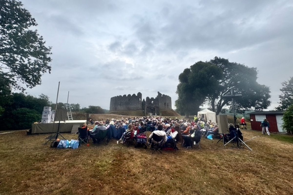 Audience watching the Miracle Theatre Company at Restormel Castle