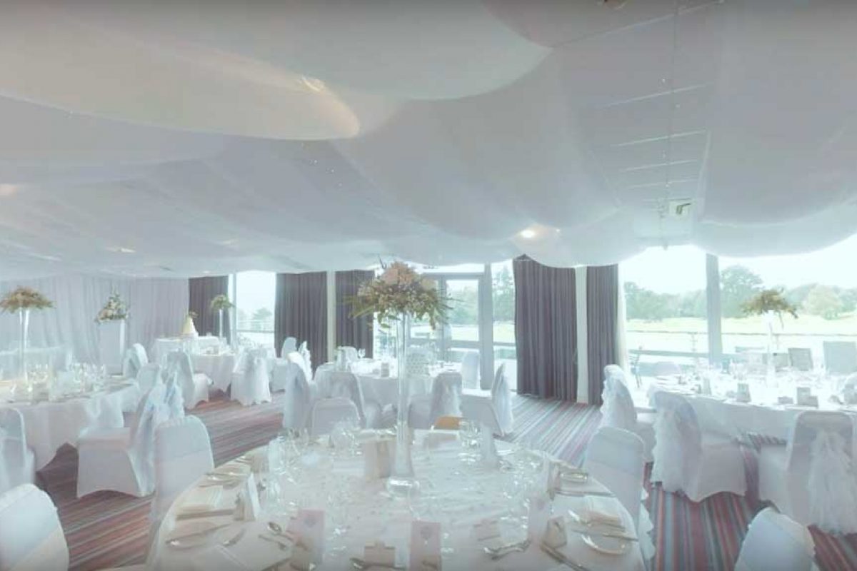 an all white formal dining room setup