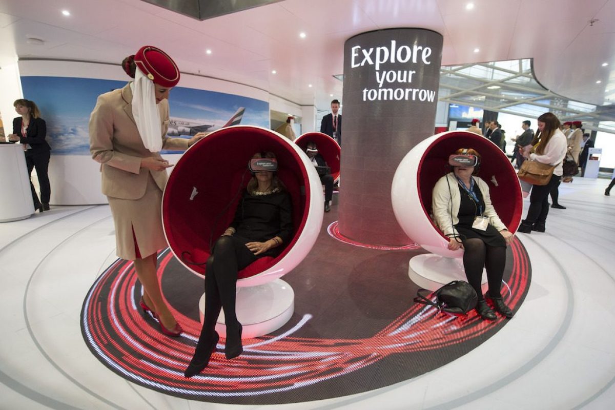 emirates business show demonstration in egg chairs with people in VR headsets