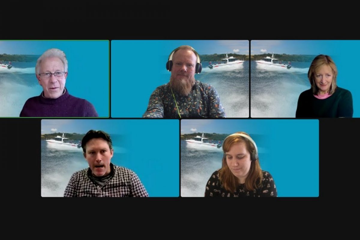 A zoom call screen with 5 people talking